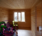 Фото одноэтажного дома 6х6 из бруса /// Деревянная отделка комнаты