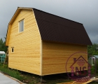 Фото построенного каркасного дома с мансардой